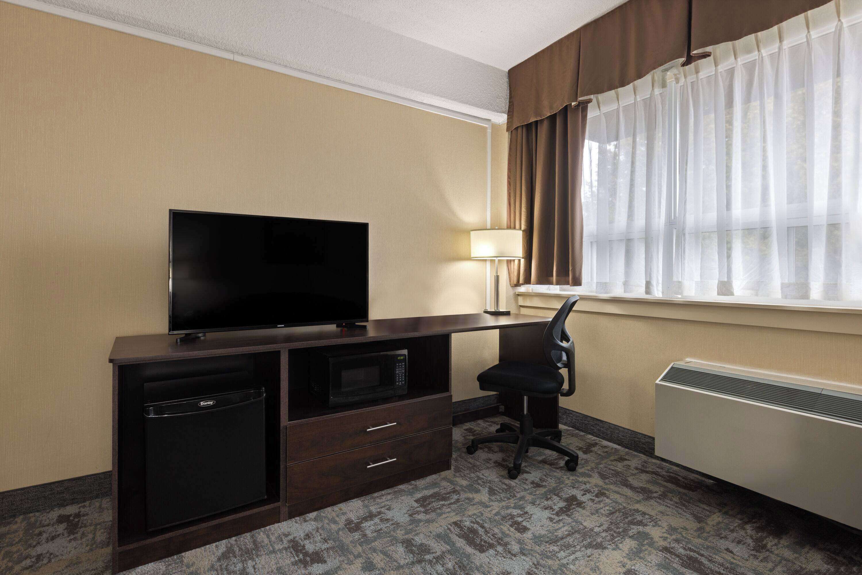 in-room safe, desk, blackout curtains, iron/ironing board