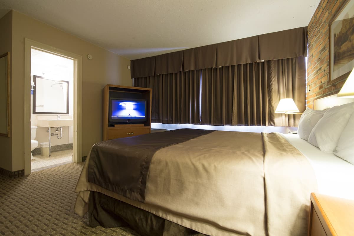 in-room safe, desk, blackout curtains, iron/ironing board