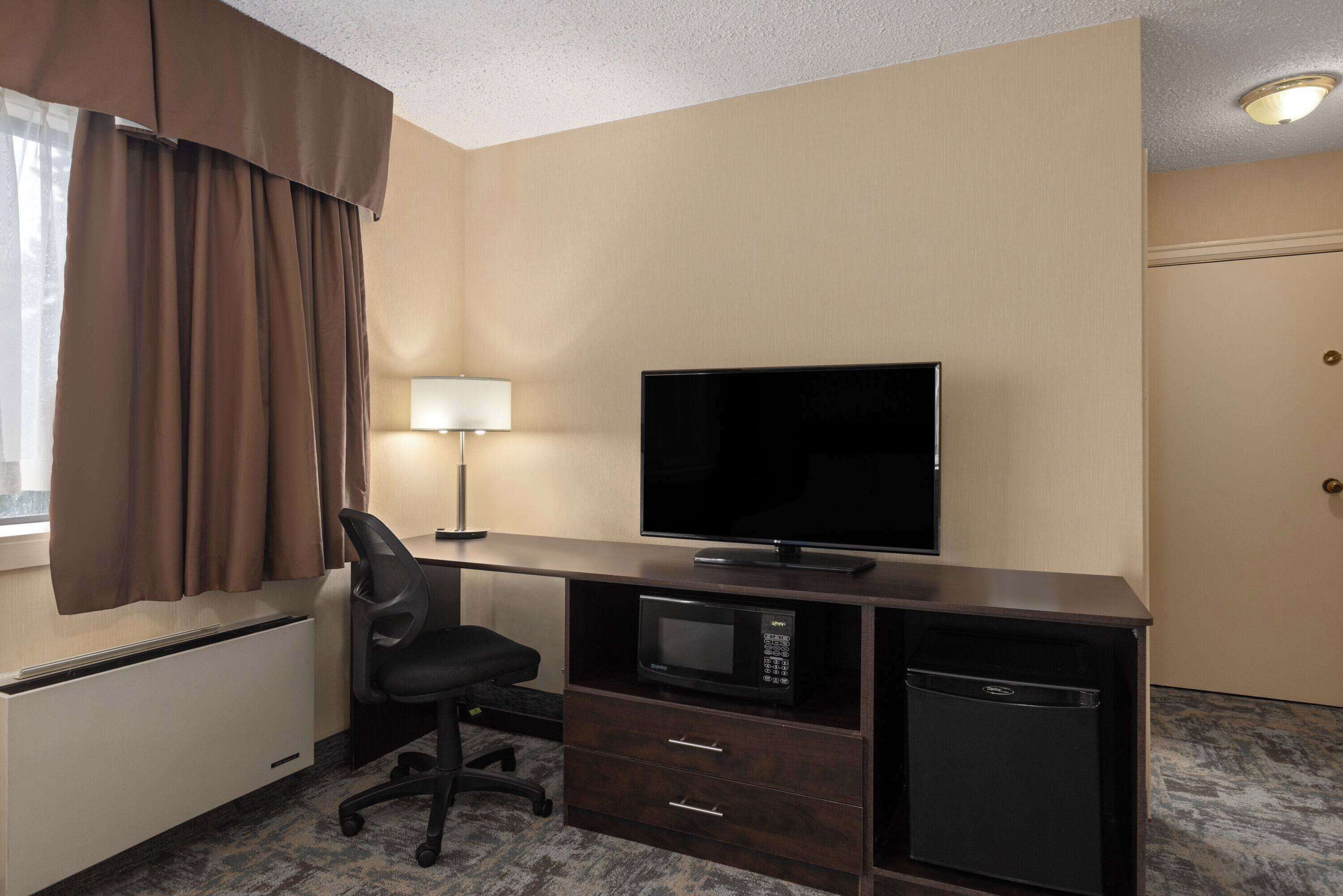 in-room safe, desk, blackout curtains, iron/ironing board