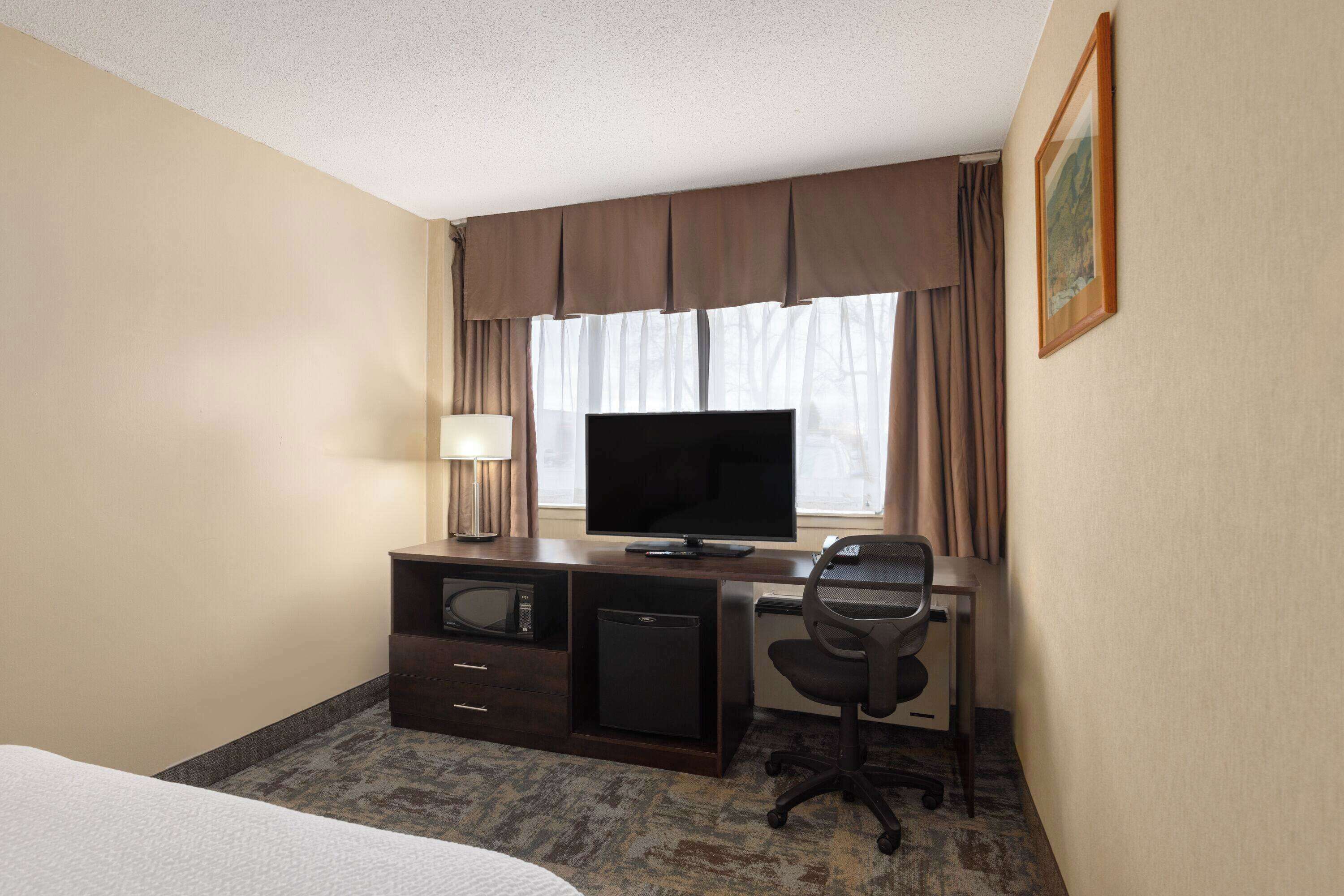 in-room safe, desk, blackout curtains, iron/ironing board
