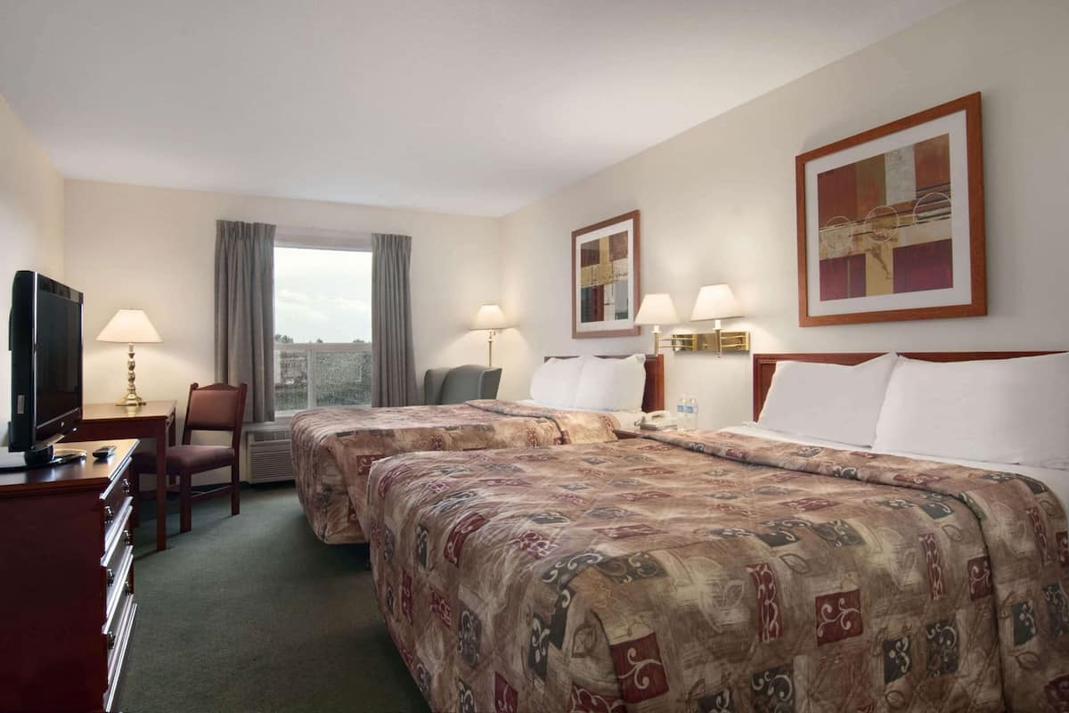 Desk, iron/ironing board, free cribs/infant beds, rollaway beds