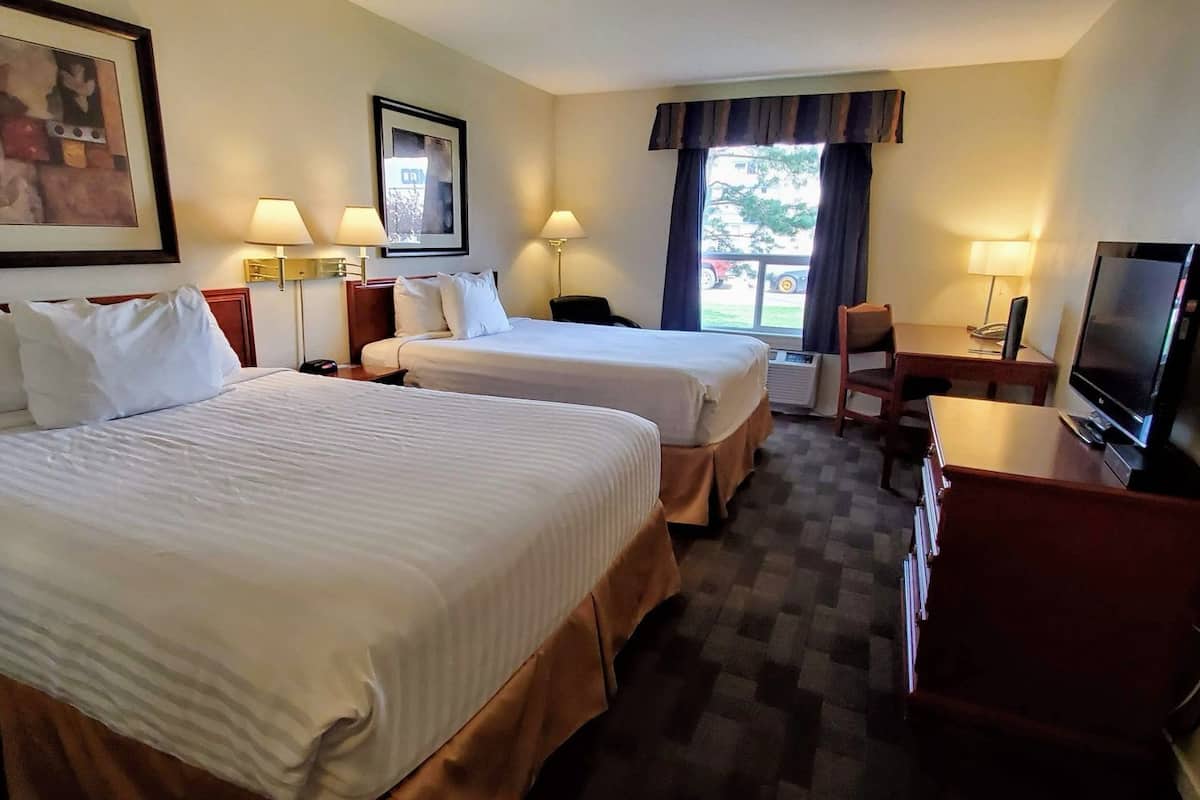 Desk, iron/ironing board, free cribs/infant beds, rollaway beds