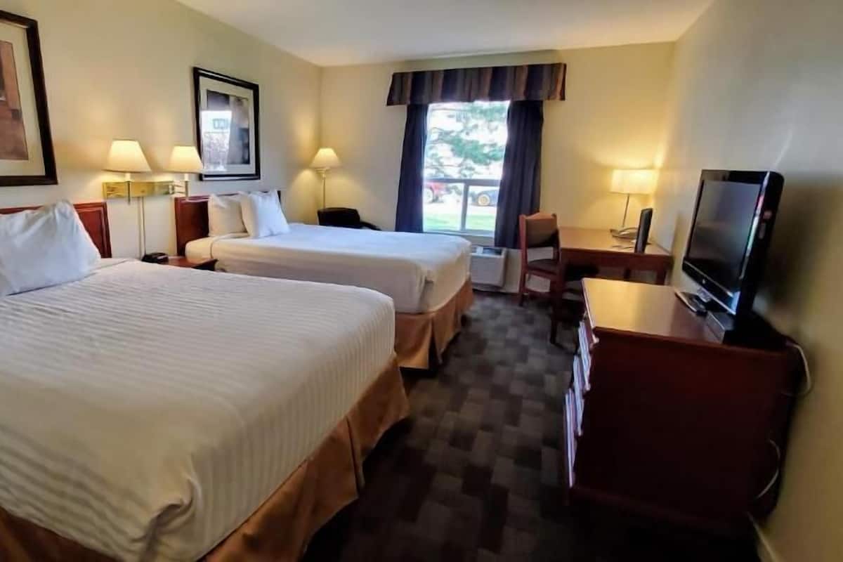 Desk, iron/ironing board, free cribs/infant beds, rollaway beds