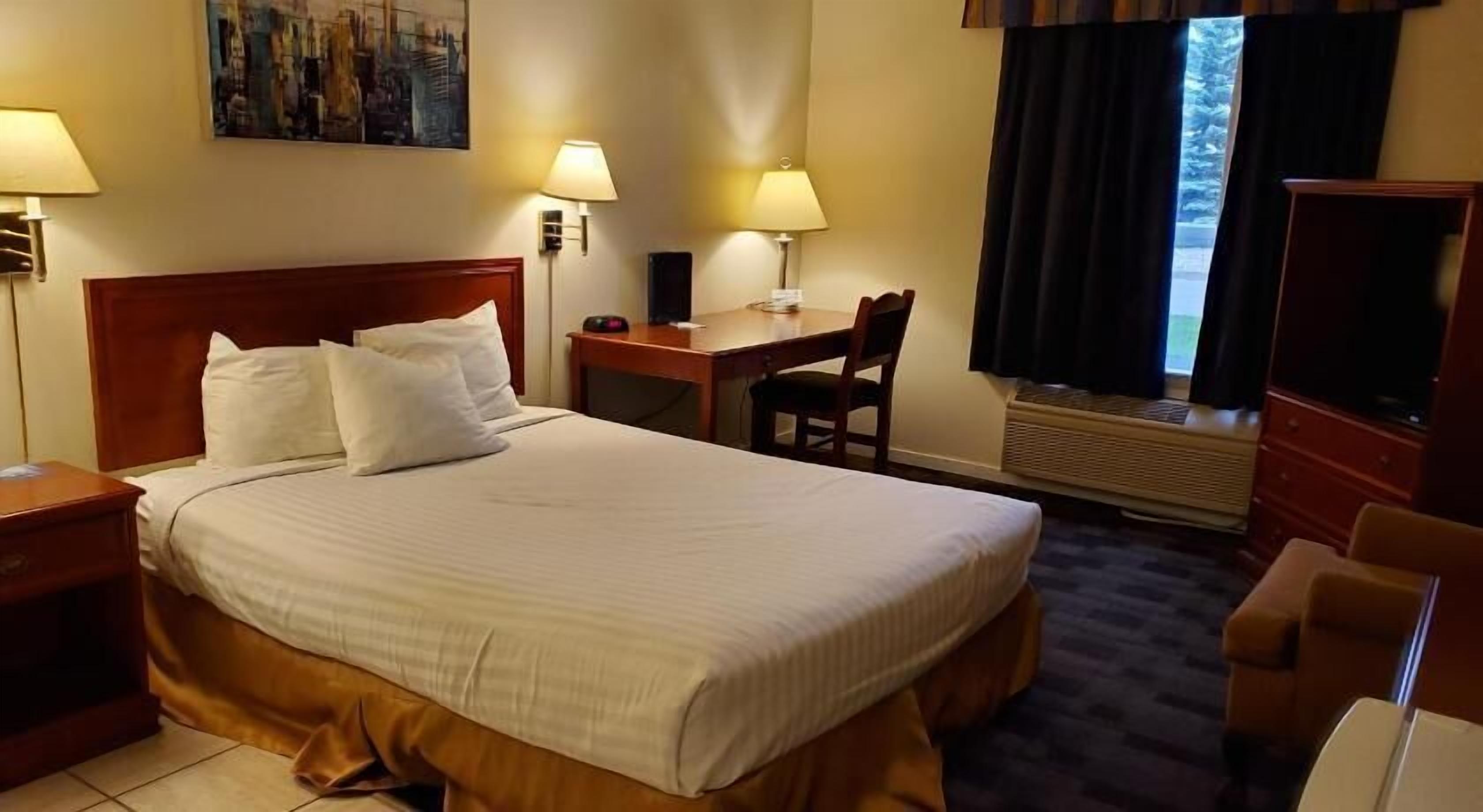 Desk, iron/ironing board, free cribs/infant beds, rollaway beds