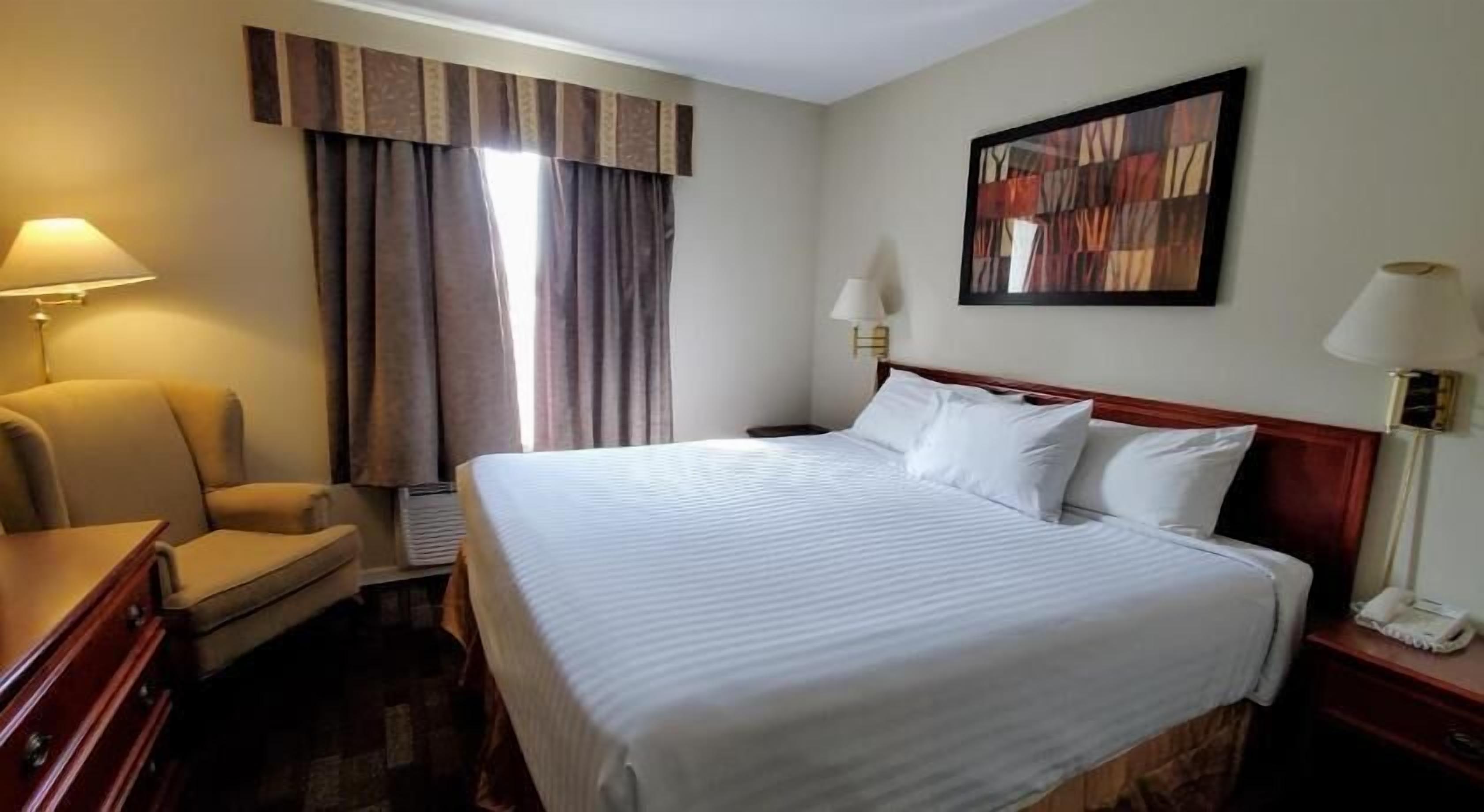 Desk, iron/ironing board, free cribs/infant beds, rollaway beds