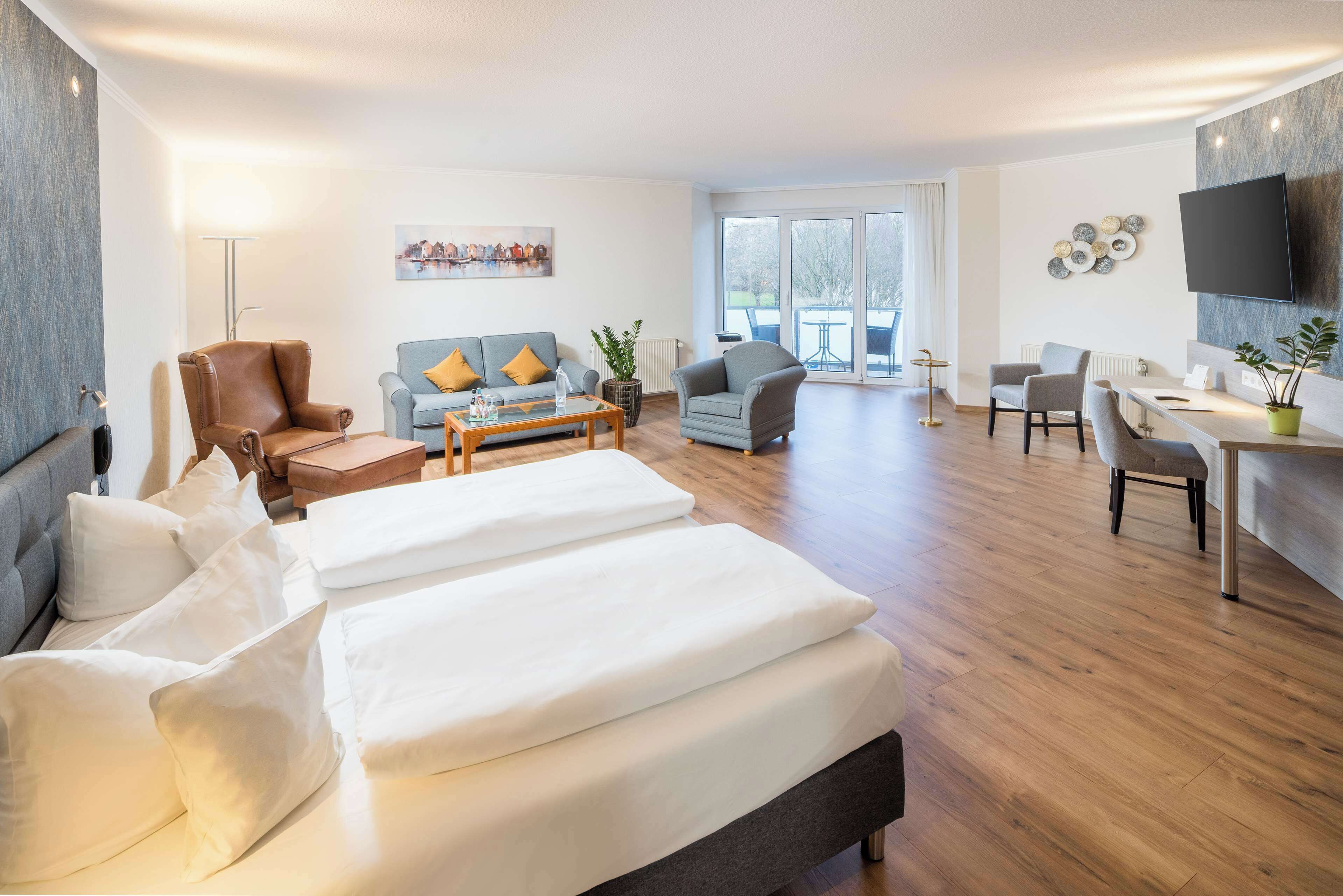 Deluxe-Zimmer, 1 Doppelbett (Cozy Sitting Corner) | Allergikerbettwaren, Minibar, Zimmersafe, Schreibtisch