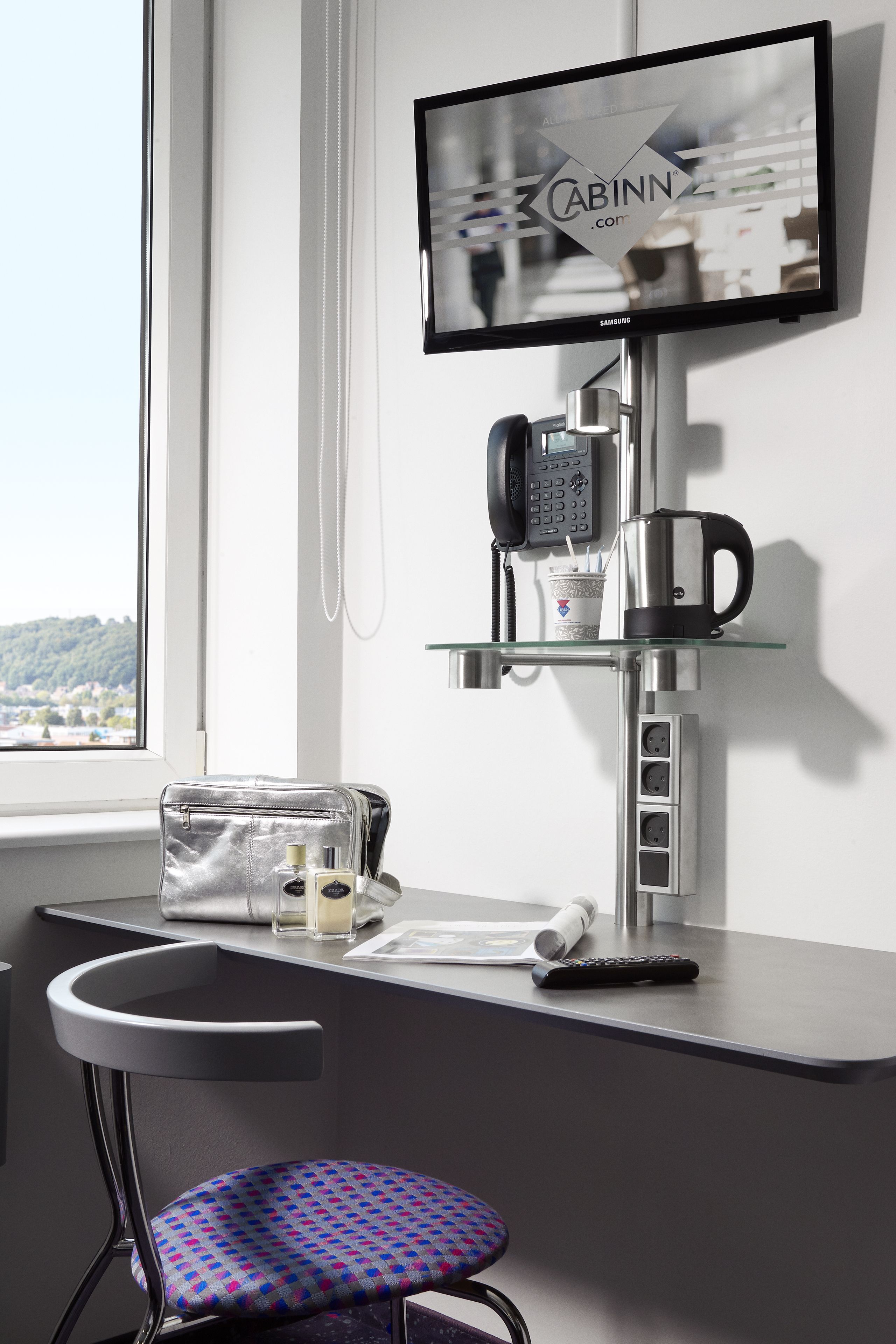 Desk, laptop workspace, blackout drapes, iron/ironing board