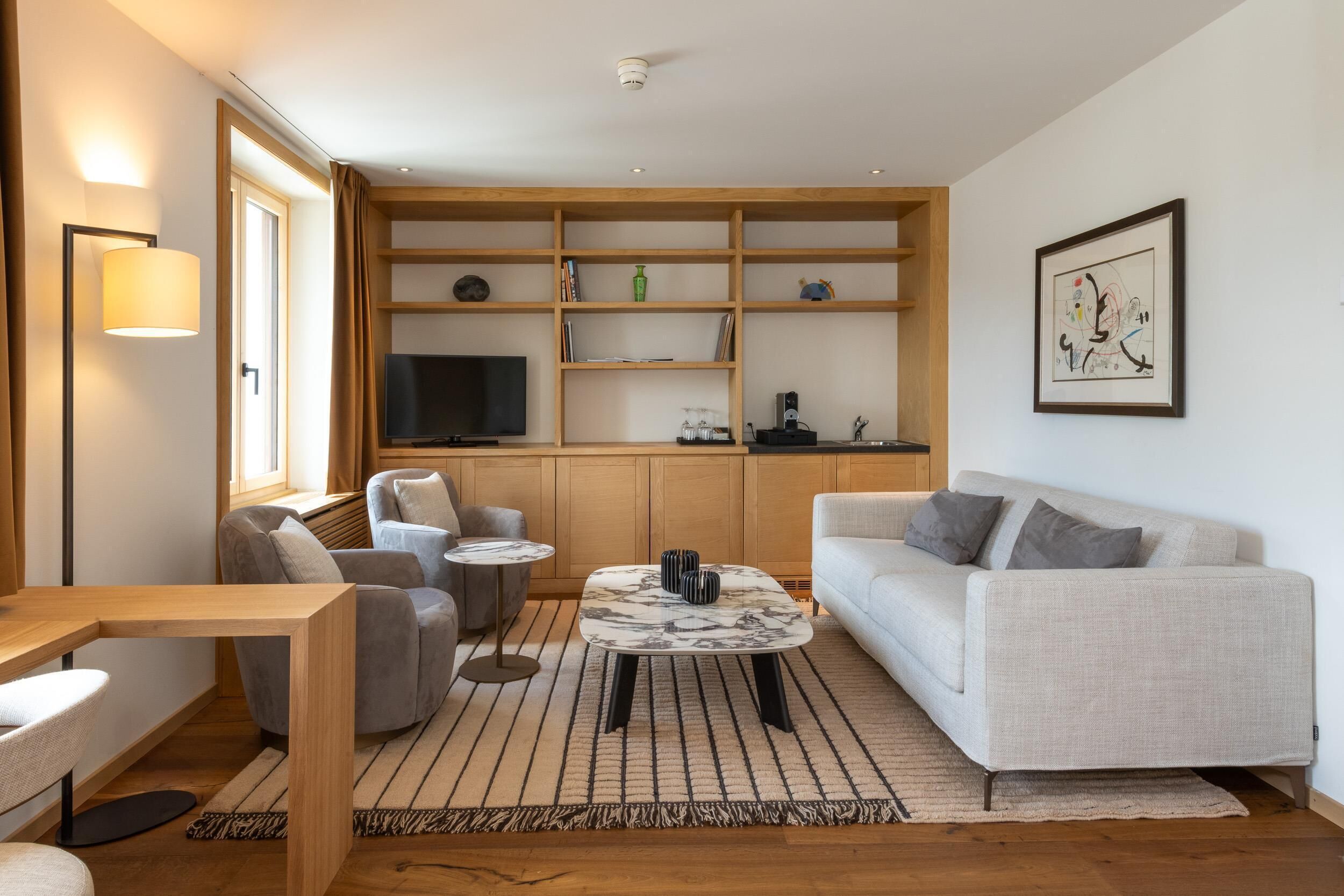 deluxe suite | premium bedding, down duvets, minibar, in-room safe