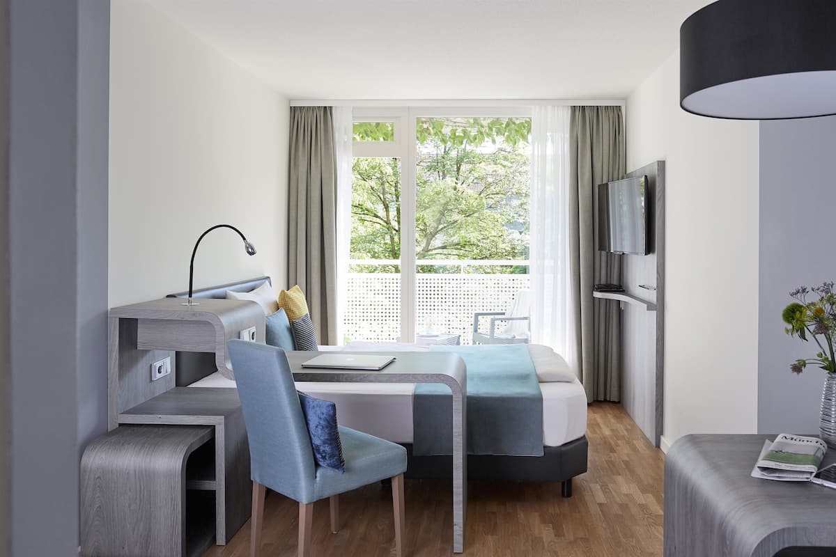 Allergivenligt sengetøj, gratis minibar, pengeskab på værelset