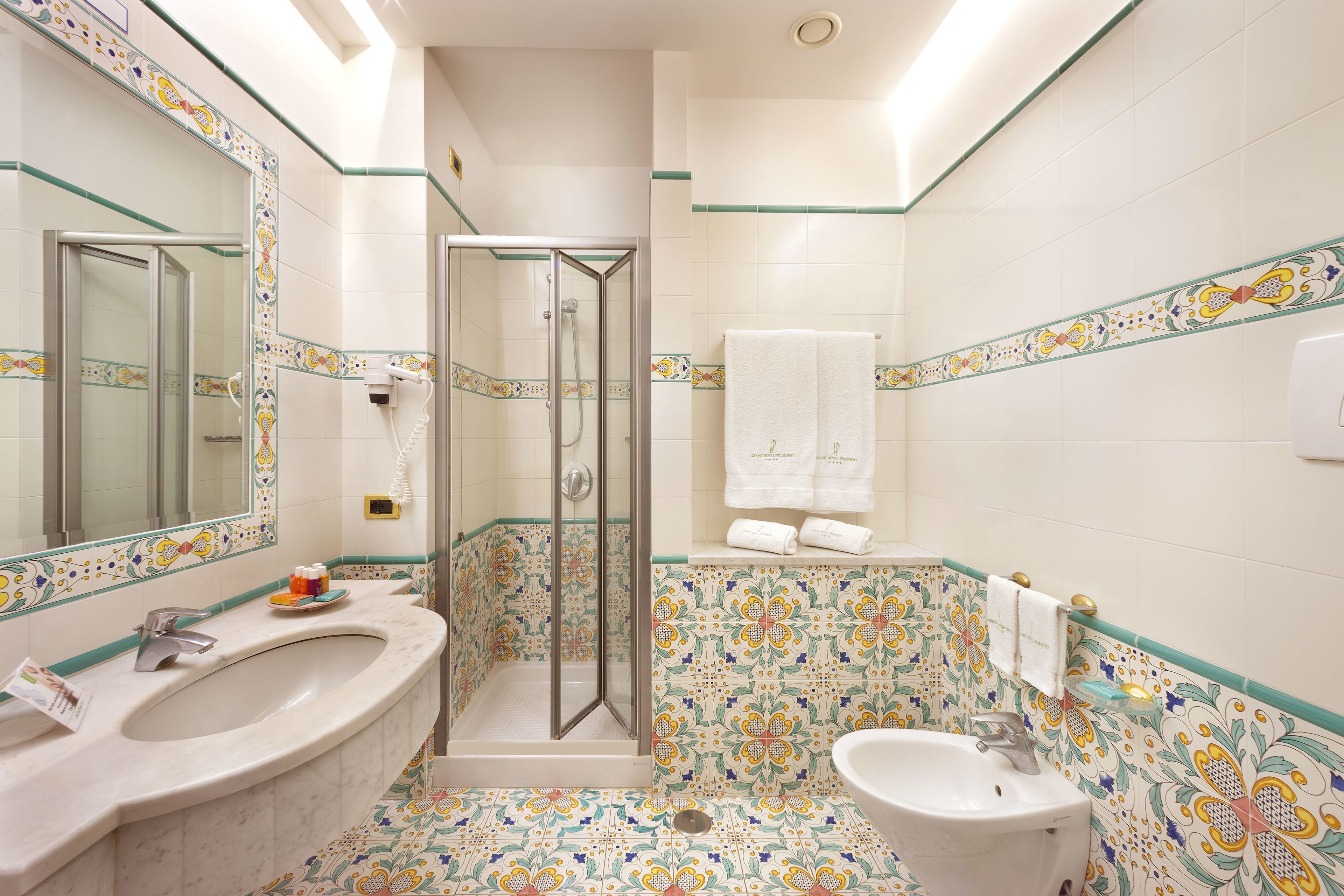 free toiletries, hair dryer, bidet, towels