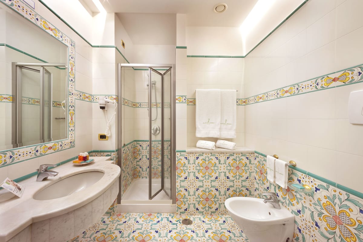 free toiletries, hair dryer, bidet, towels