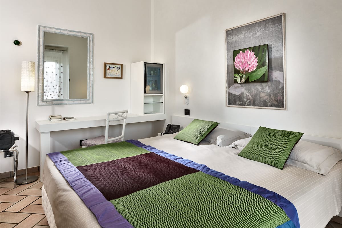 Premium bedding, memory foam beds, minibar, in-room safe