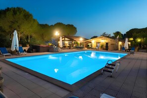 Seasonal outdoor pool, open 7:30 AM to 7:30 PM, pool umbrellas