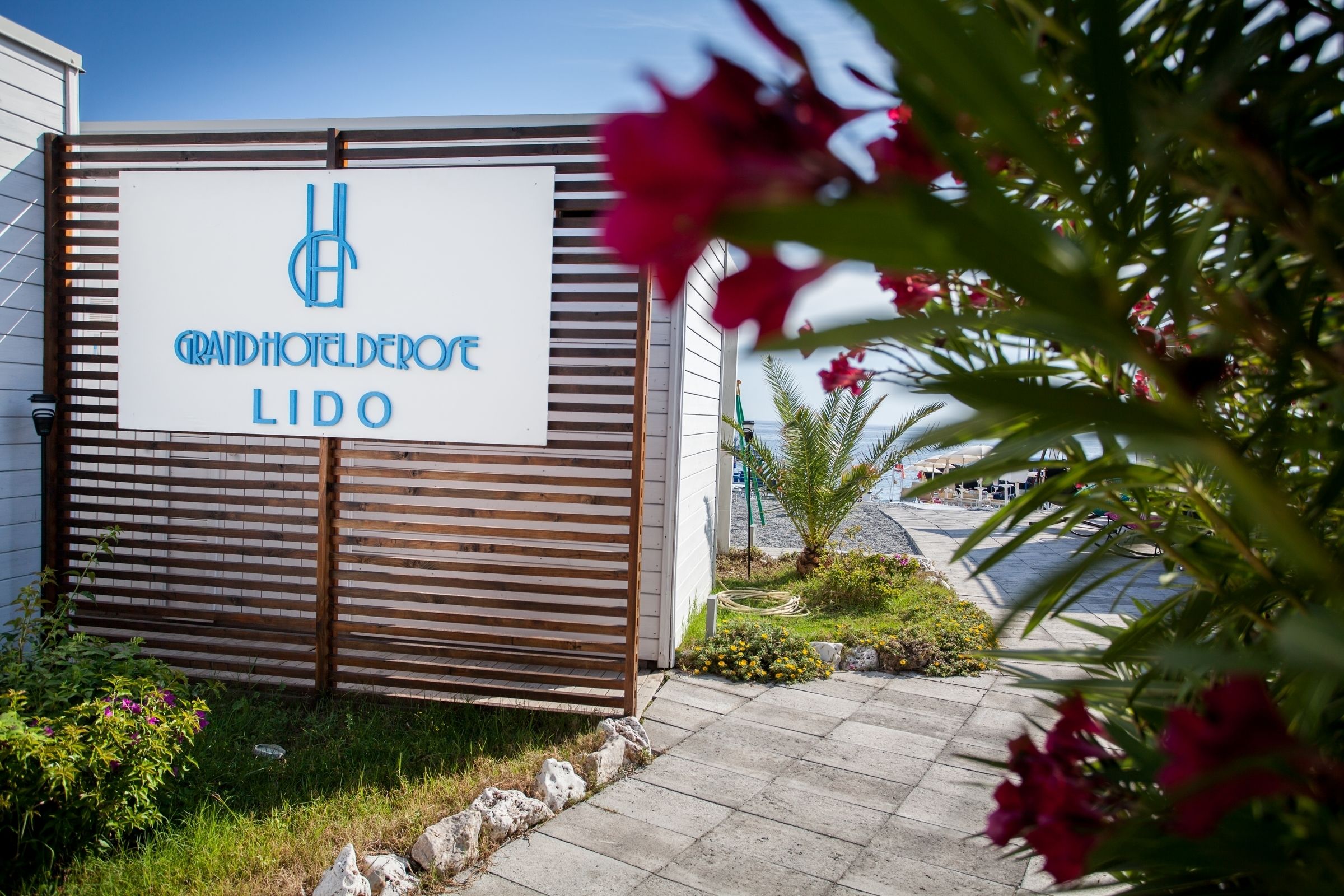 private beach, sun-loungers, beach umbrellas, beach towels