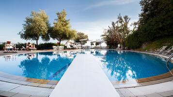 Outdoor pool, open 8:00 AM to 6:00 PM, cabanas (surcharge)