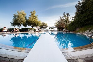 Outdoor pool, open 8:00 AM to 6:00 PM, pool cabanas (surcharge)