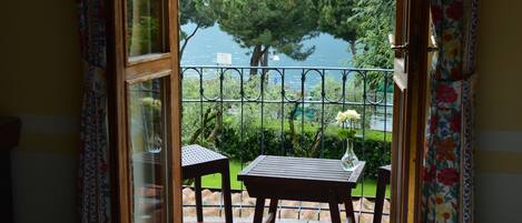 Double or Twin Room, Balcony, Lake View | Minibar, in-room safe, desk, rollaway beds