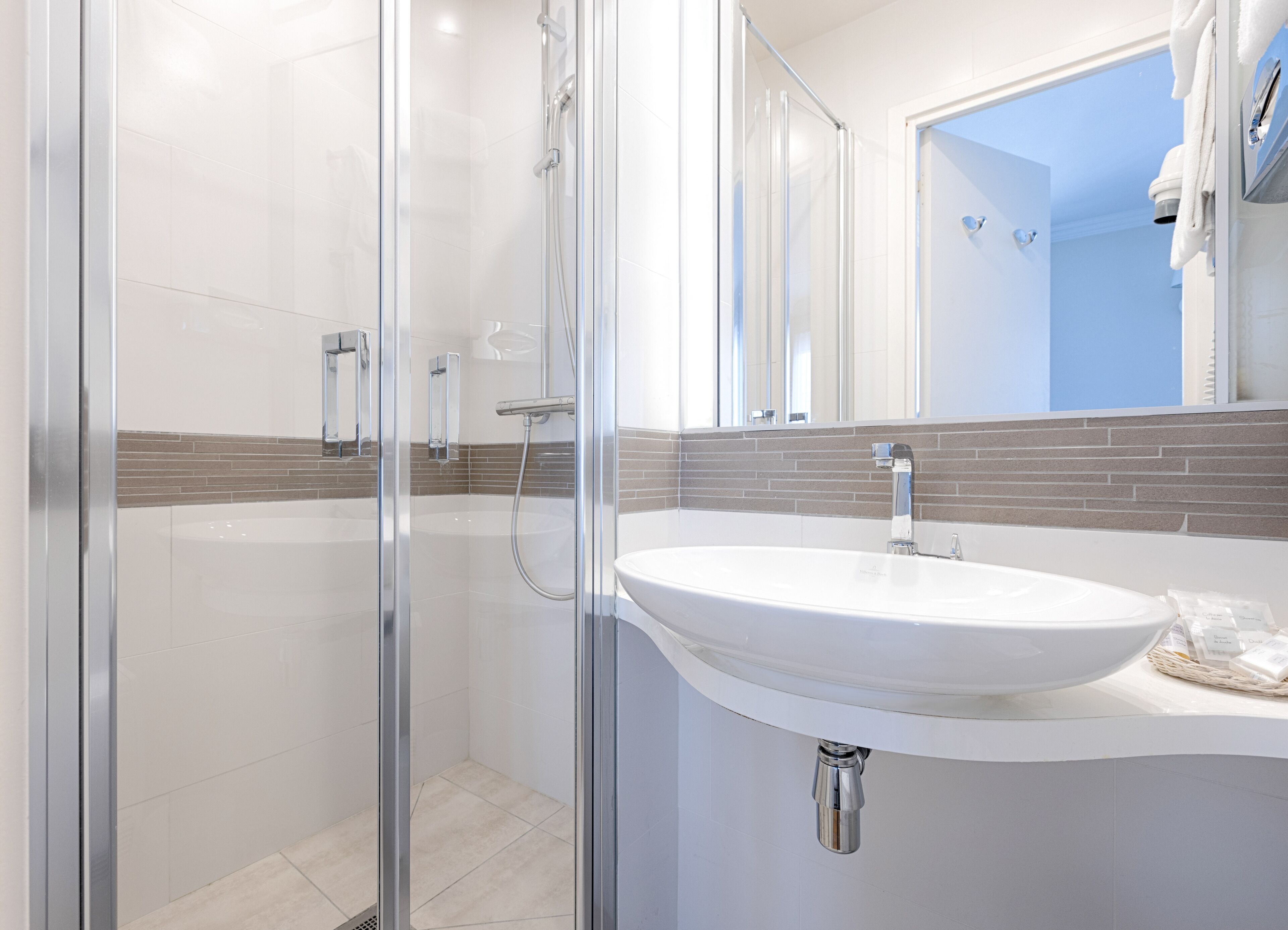 superior double room | bathroom | hair dryer, towels