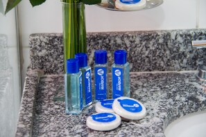 Shower, eco-friendly toiletries, hair dryer, towels