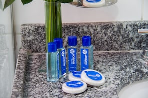 Shower, eco-friendly toiletries, hair dryer, towels