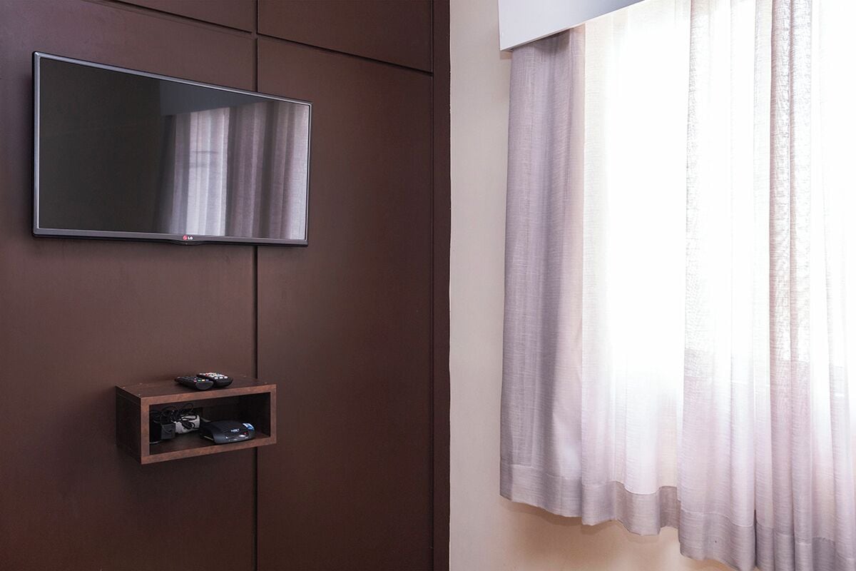 quarto superior | living area | lcd tv