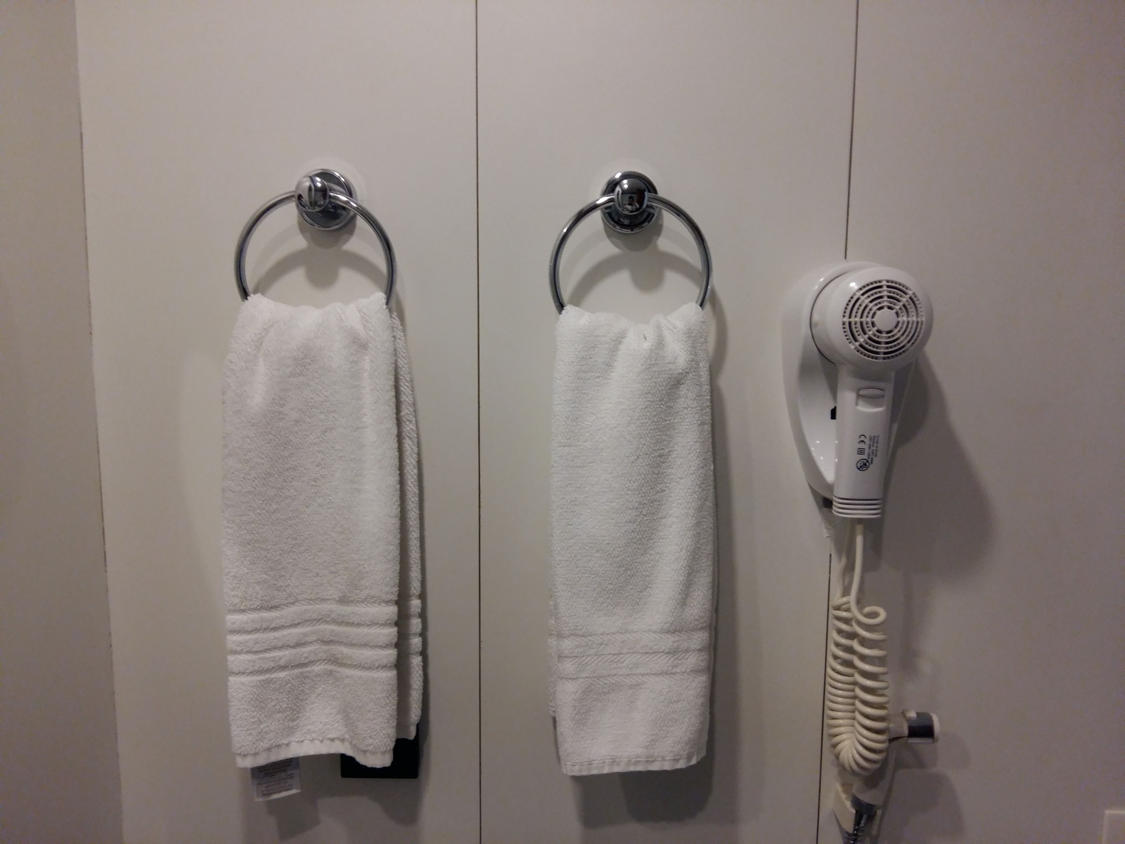 shower, rainfall showerhead, hair dryer, towels