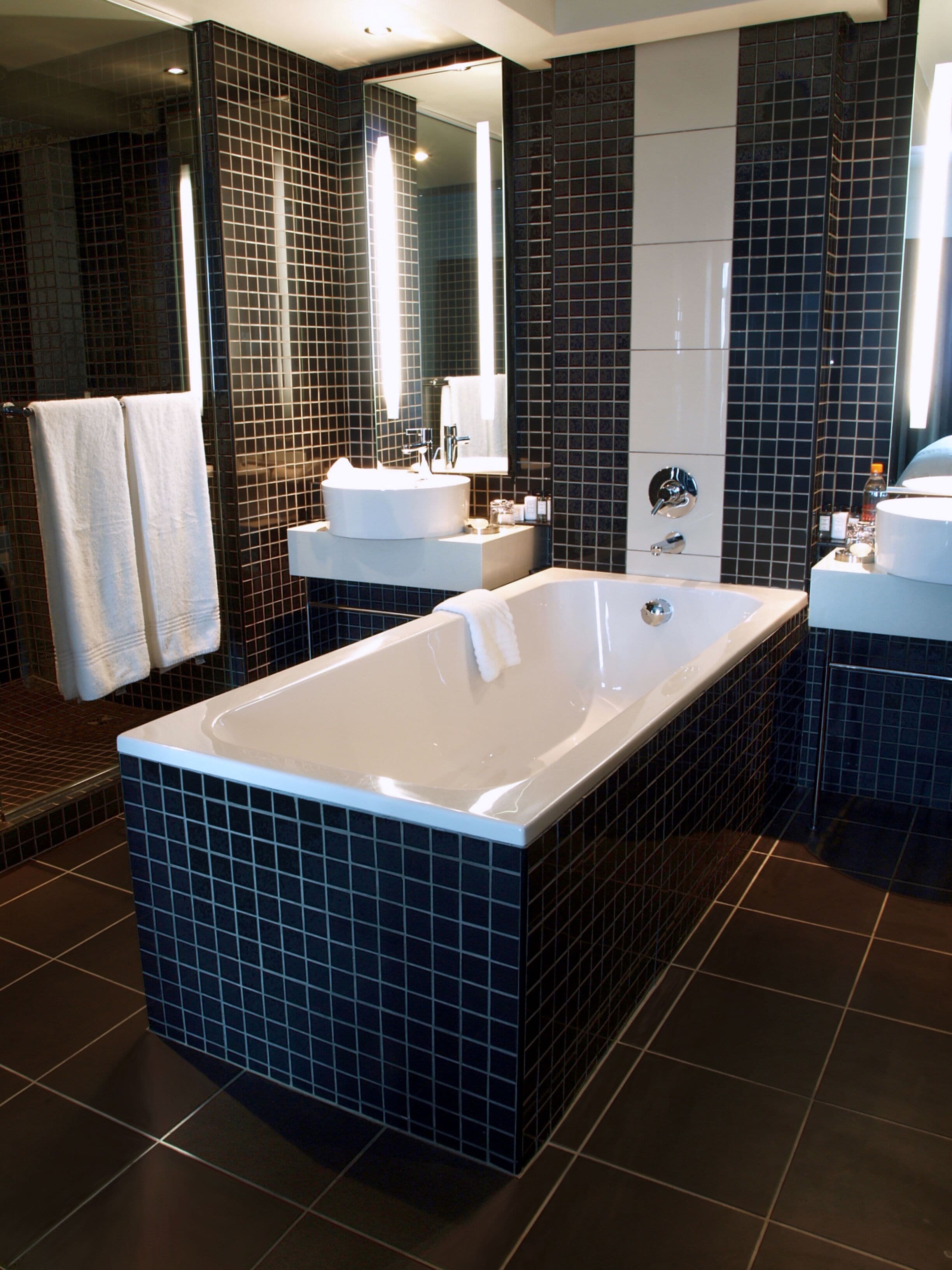 suite | bathroom | designer toiletries, hair dryer, bathrobes, towels