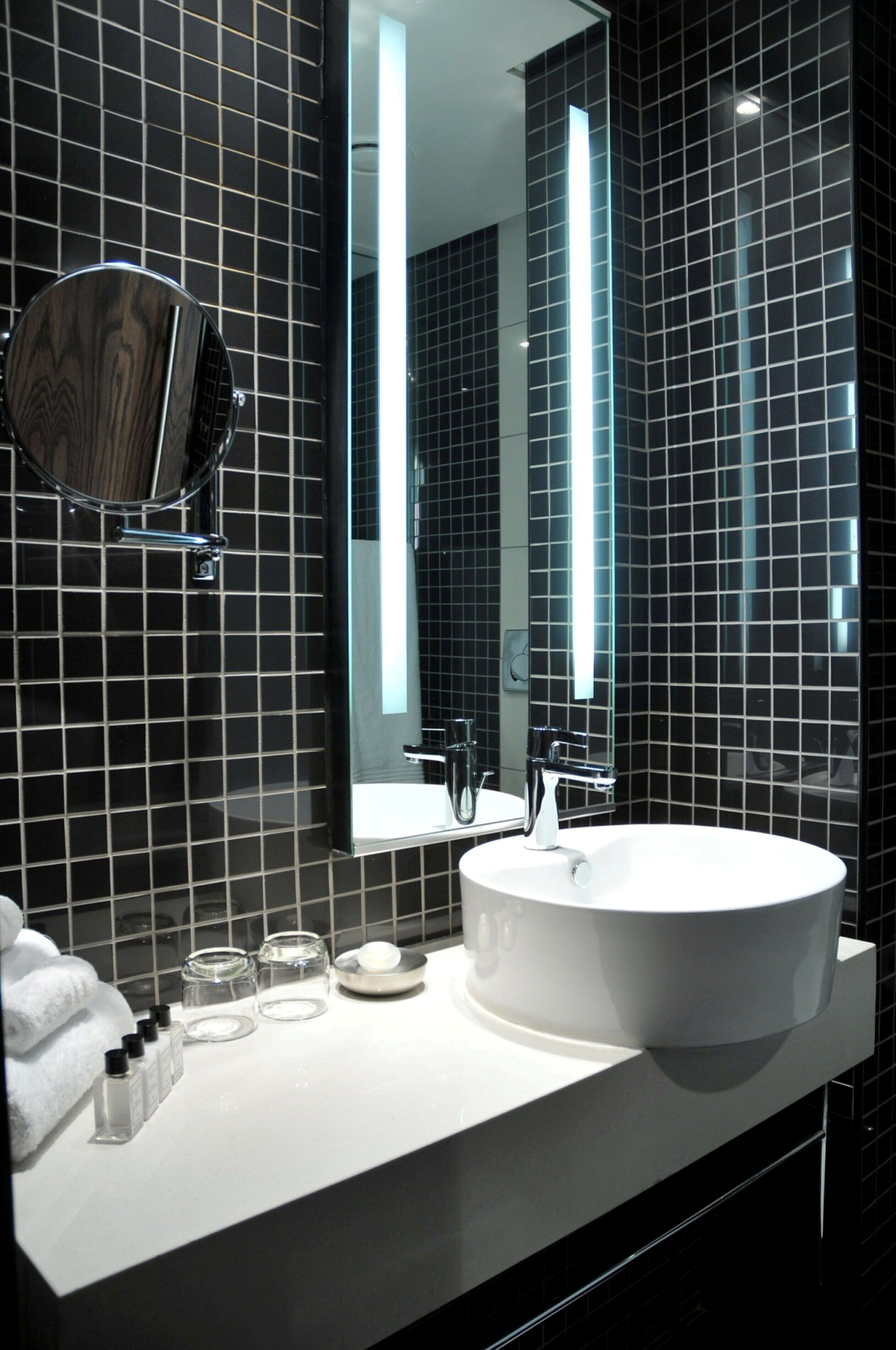 designer toiletries, hair dryer, bathrobes, towels