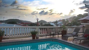 Outdoor pool, sun loungers