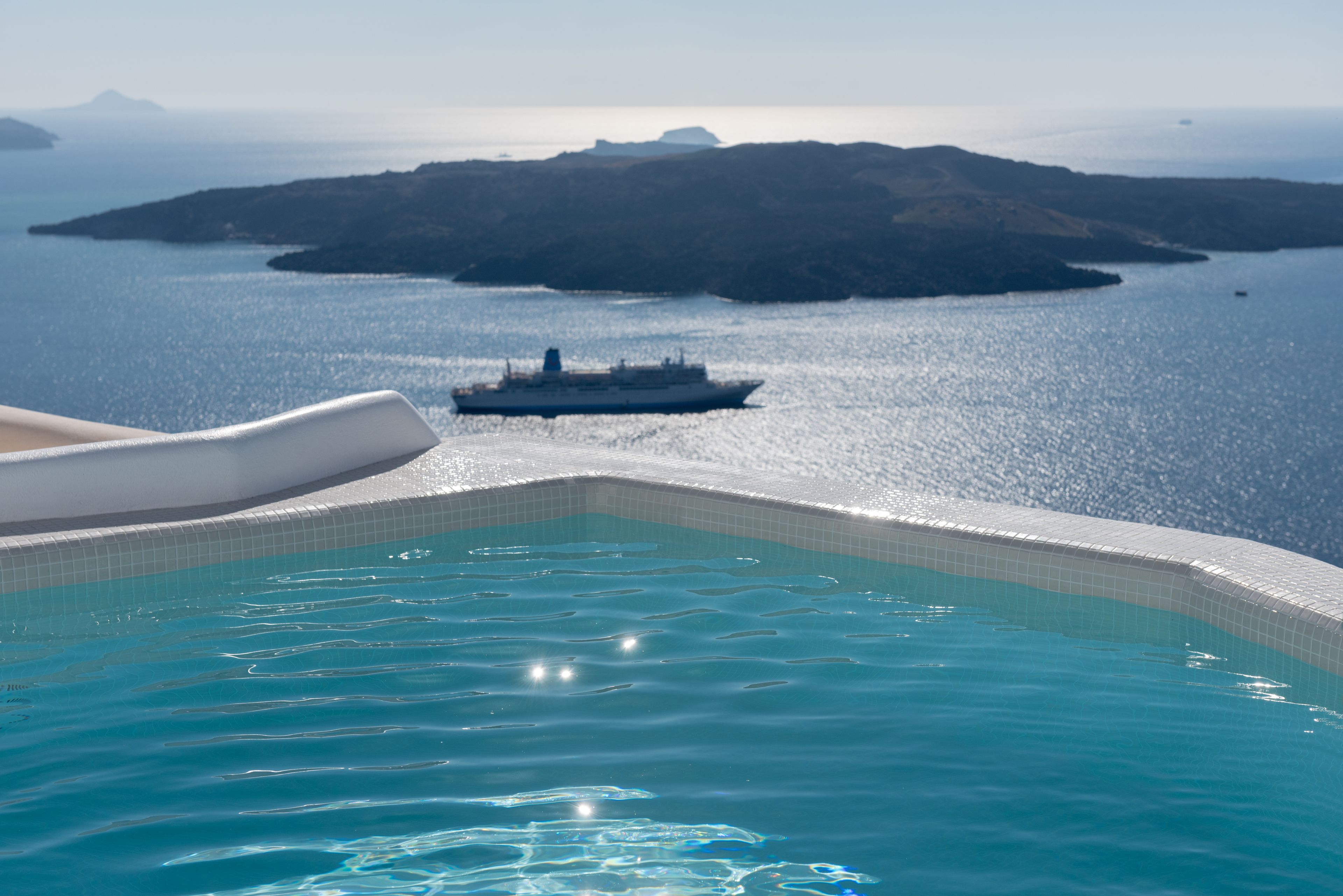 outdoor pool, pool umbrellas, pool loungers