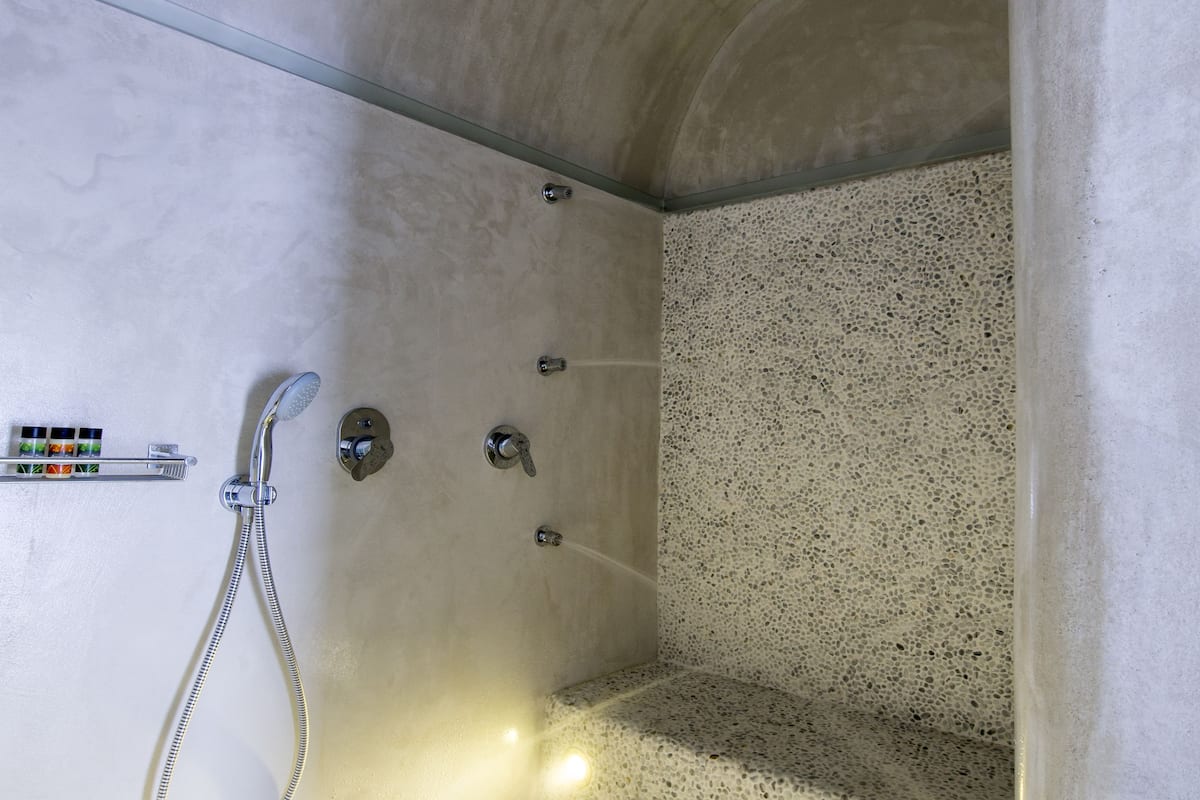 junior suite | bathroom | eco-friendly toiletries, hair dryer, bathrobes, slippers