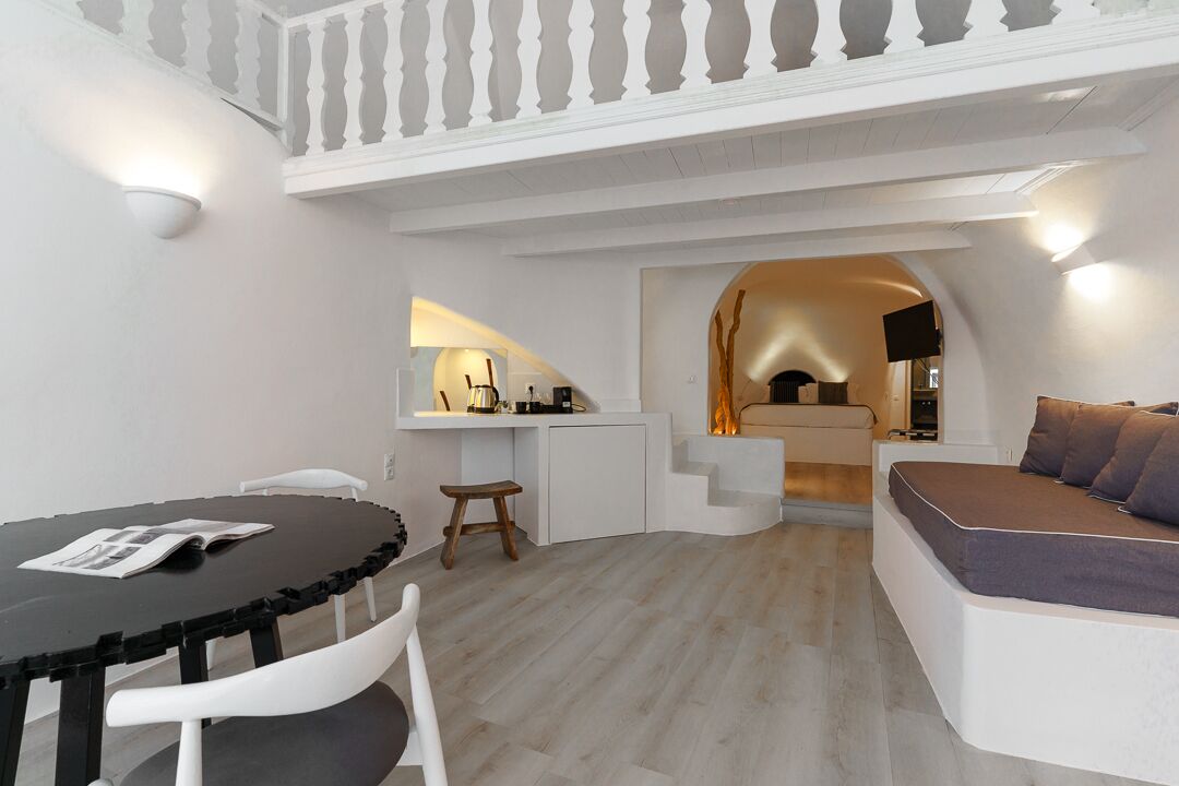 junior suite (caldera view) | living area | 20-inch tv with cable channels