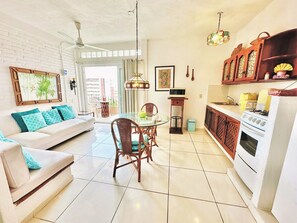 Deluxe Studio Suite | Living area | TV