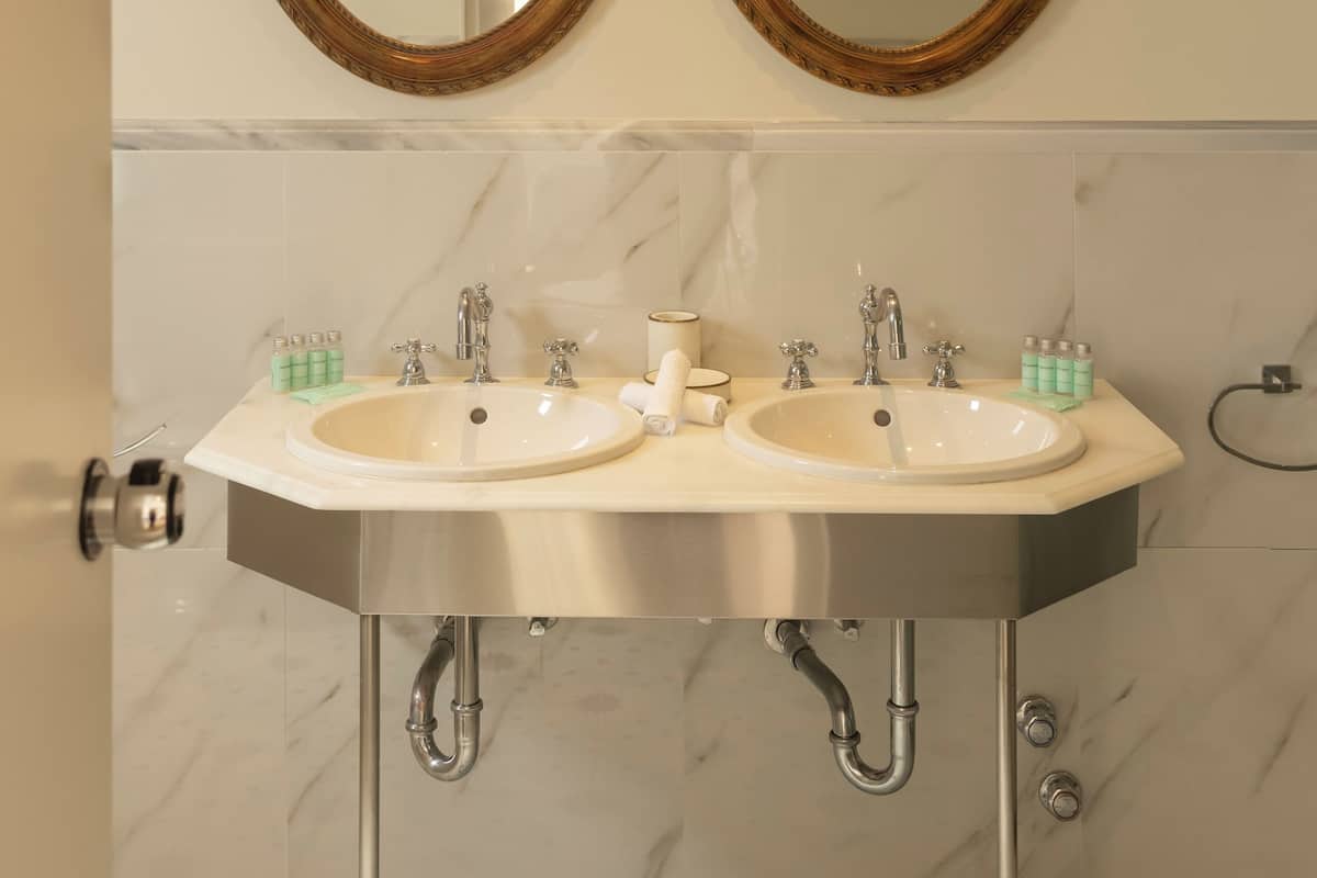 superior room, bay view | bathroom | bathtub, designer toiletries, hair dryer, bathrobes