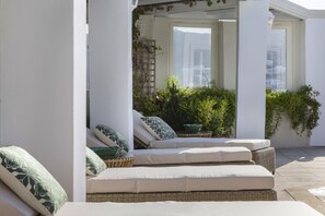 Seasonal outdoor pool, pool umbrellas, pool loungers