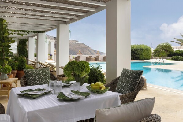Seasonal outdoor pool, pool umbrellas, sun loungers