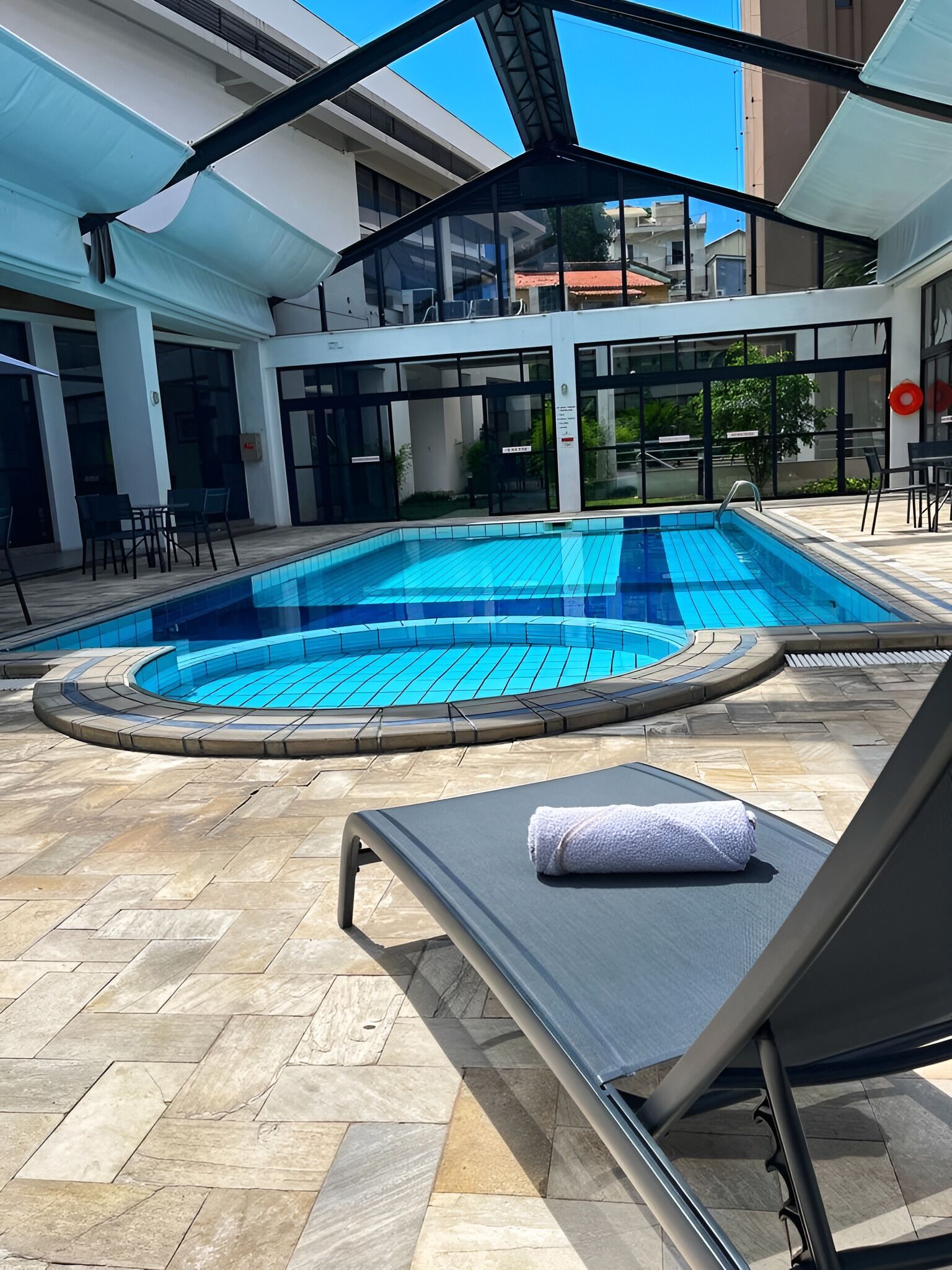 indoor pool, outdoor pool, open 8:00 am to 10:00 pm, pool loungers