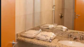Shower, towels, soap, toilet paper
