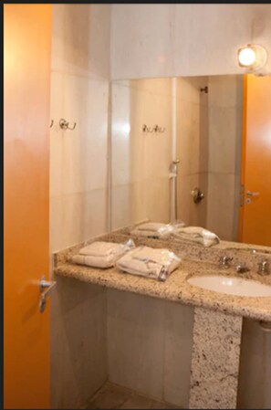 Shower, towels, soap, toilet paper