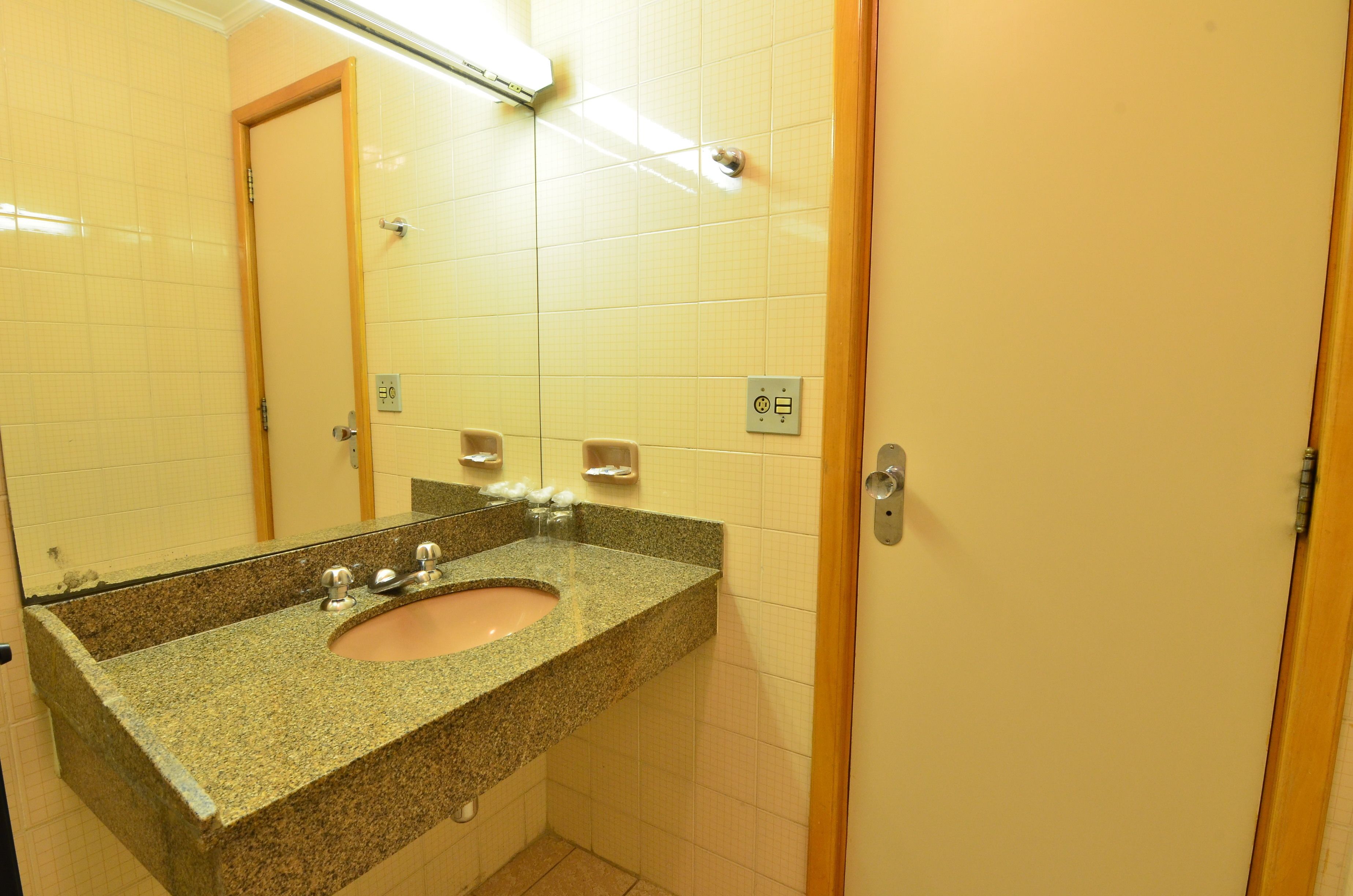 standard twin room | bathroom | shower, hair dryer, towels, soap