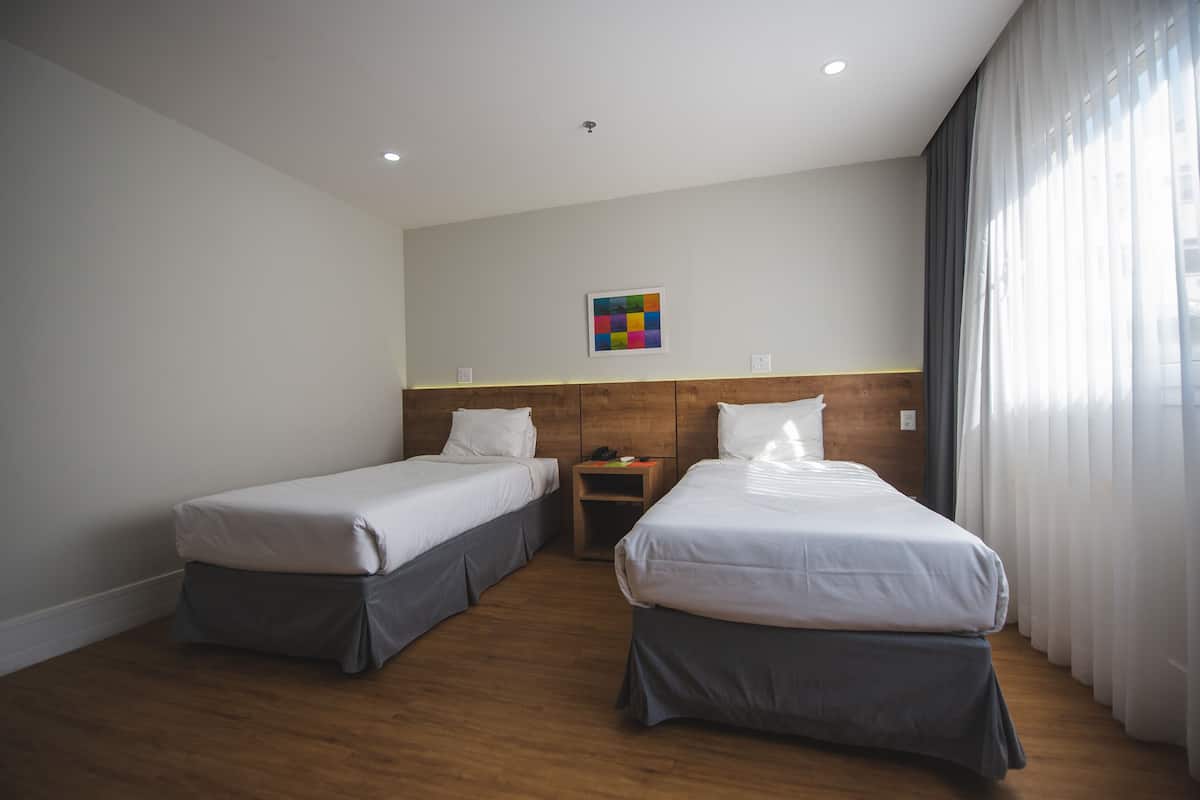 Premium bedding, pillow-top beds, minibar, desk