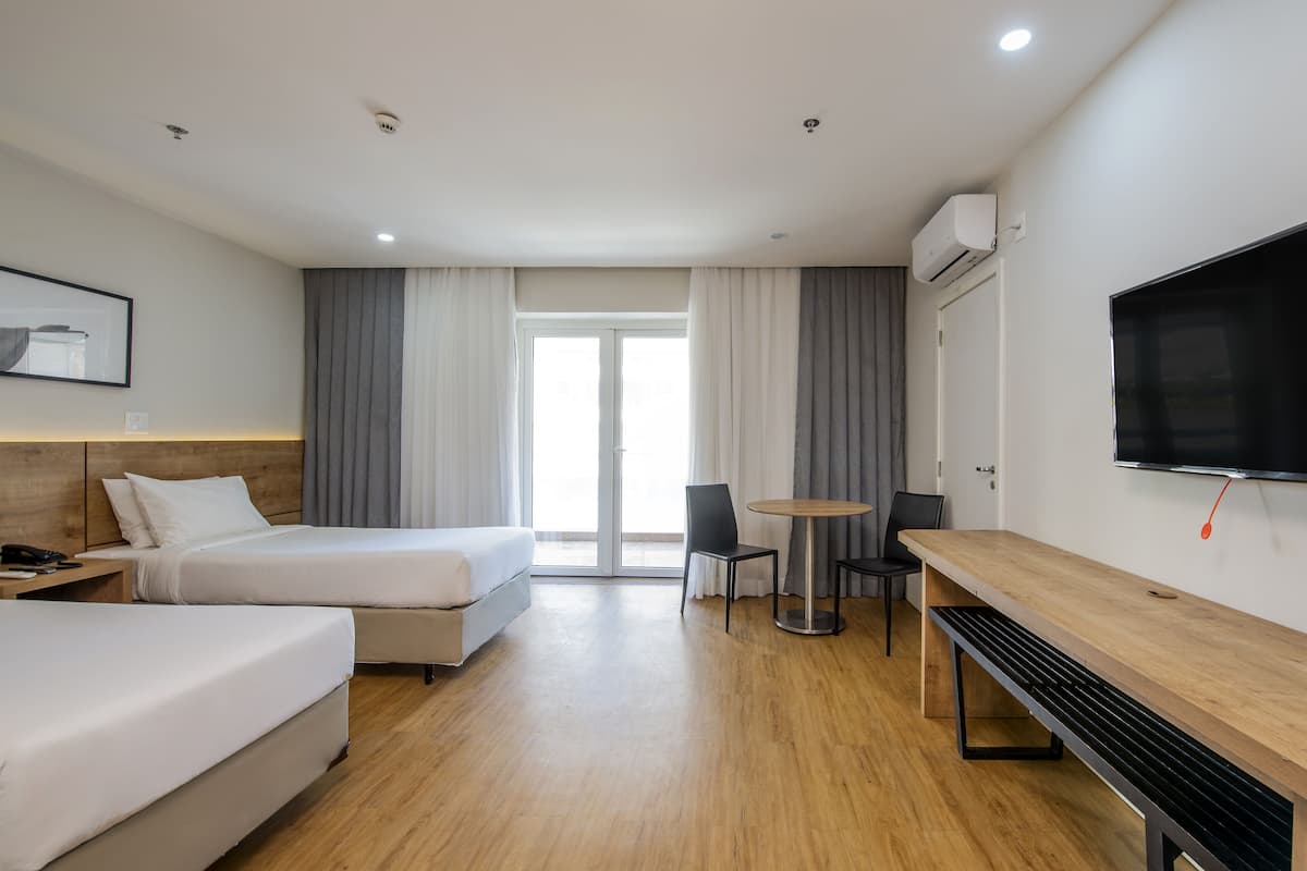 Premium bedding, pillow-top beds, minibar, desk