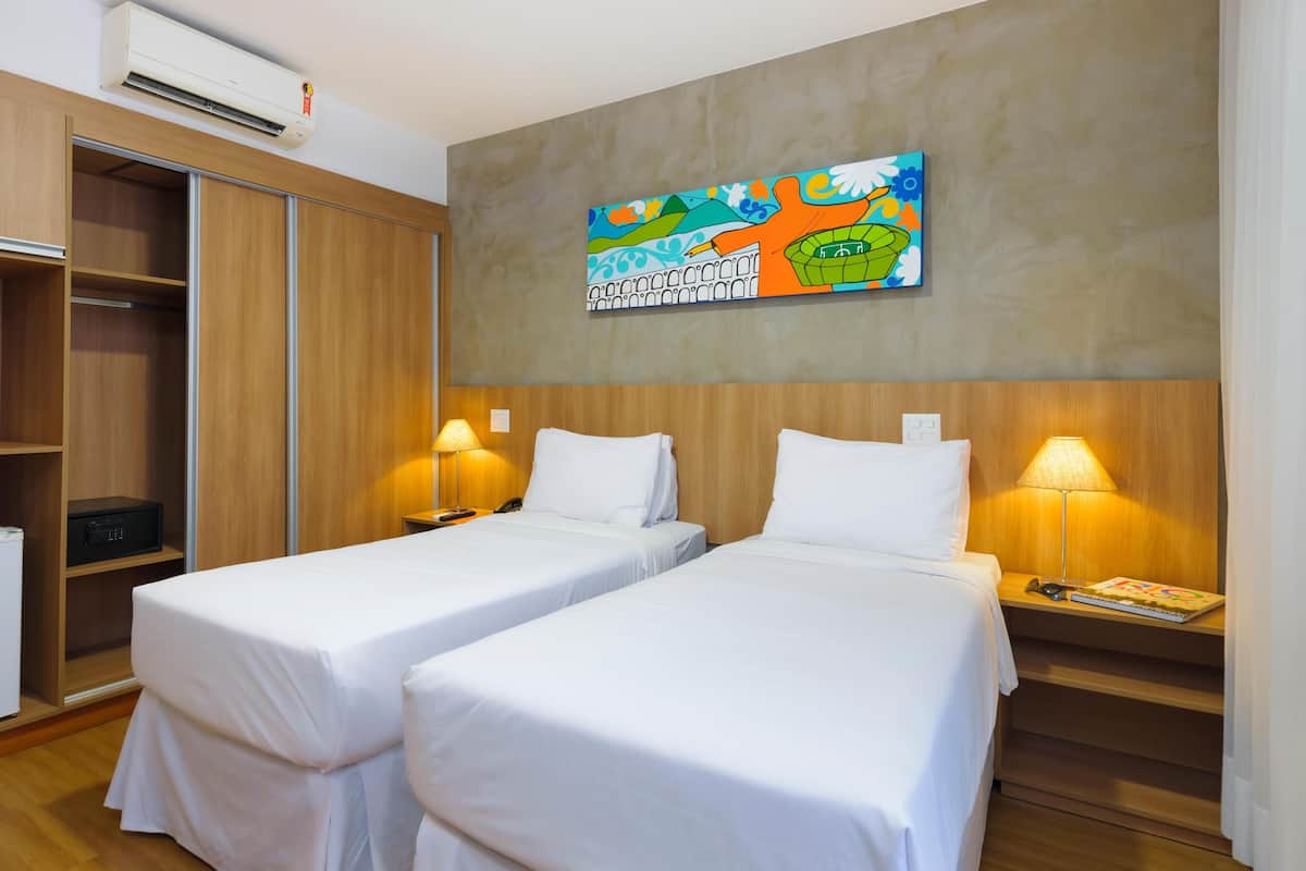 Premium bedding, pillow-top beds, minibar, desk