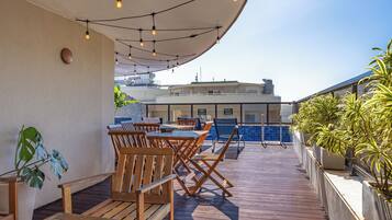 Outdoor pool, open 9:00 AM to 6:00 PM, pool umbrellas, pool loungers