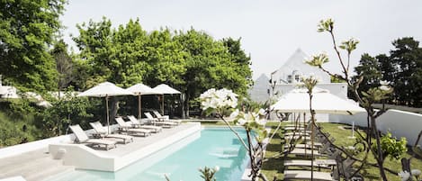 Outdoor pool, pool umbrellas, pool loungers