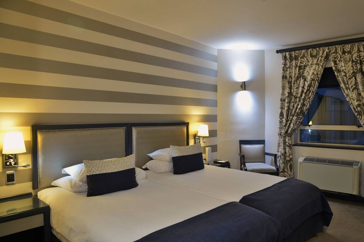 Premium bedding, minibar, in-room safe, desk