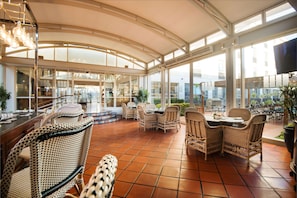 Cocktail bar, pool views, open daily