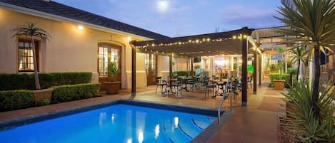 Outdoor pool, pool umbrellas, sun loungers