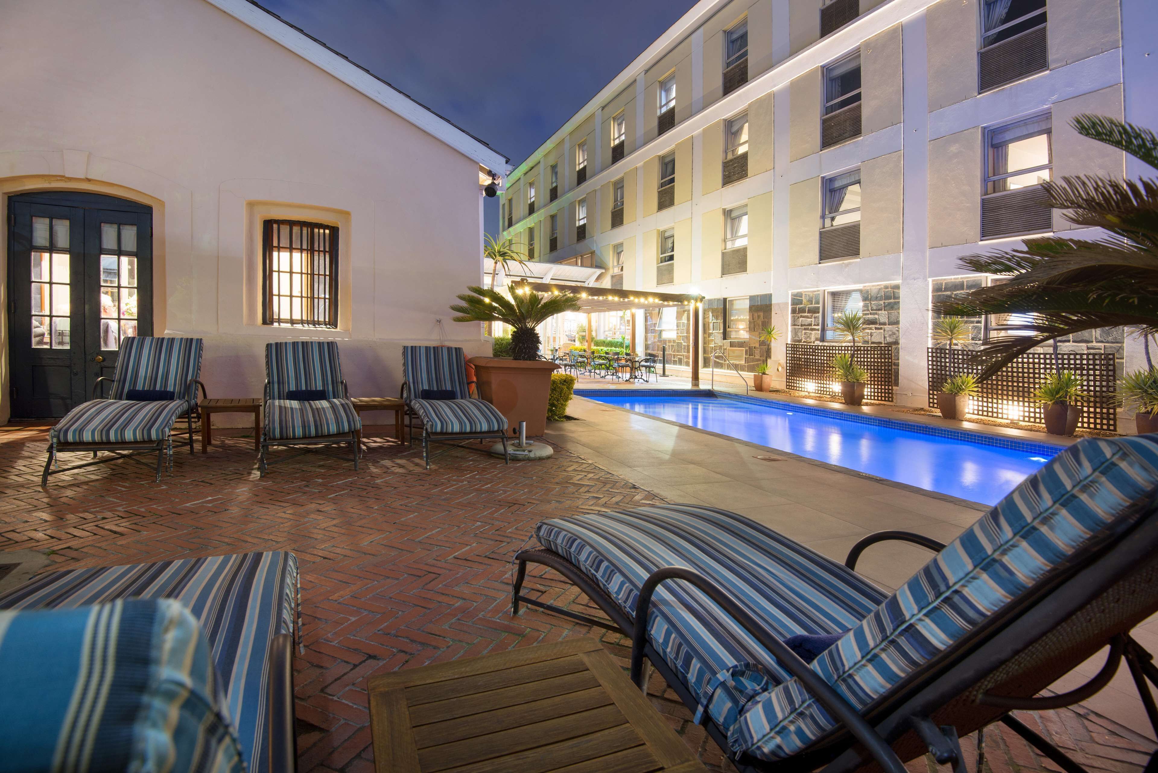 outdoor pool, pool umbrellas, pool loungers