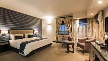Studio, 1 Tempat Tidur King | Seprai premium, minibar, brankas, dan meja kerja
